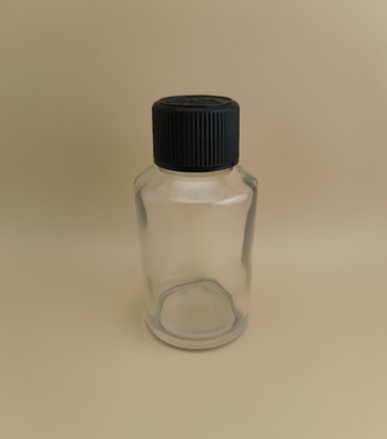 繊細なデザイン 透明 滑らかな丸いガラスボトル 薬剤用の特別な蓋付き