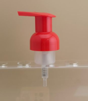 洗濯機 の ボトル に 用い られる 赤色 の プラスチック 泡 の ポンプ