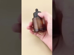 繊細なデザイン クリアブラウン スムーズ ラウンド ドロッパーボトル エッセンス用