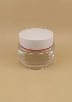 透明なボトル 白いカバー 皮膚ケア用 金枠製品