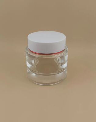 透明なボトル 白いカバー 皮膚ケア用 金枠製品