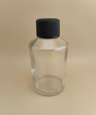 繊細なデザインの透明で滑らかな丸い大きなガラス瓶、薬剤用特殊蓋付き